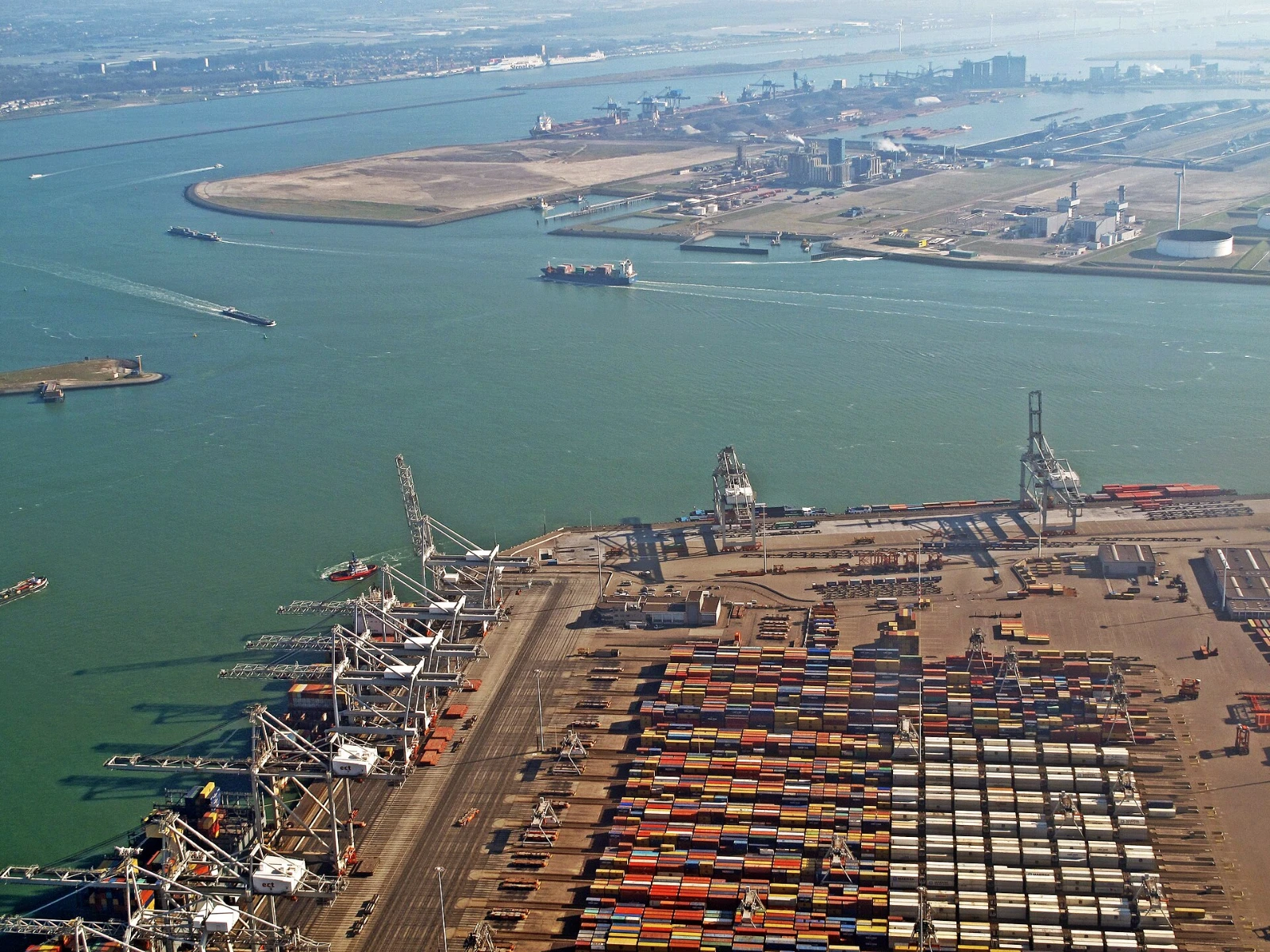 Aerial photograph of container stacks, cargo cranes and ships at Maasvlakte in the Port of Rotterdam
